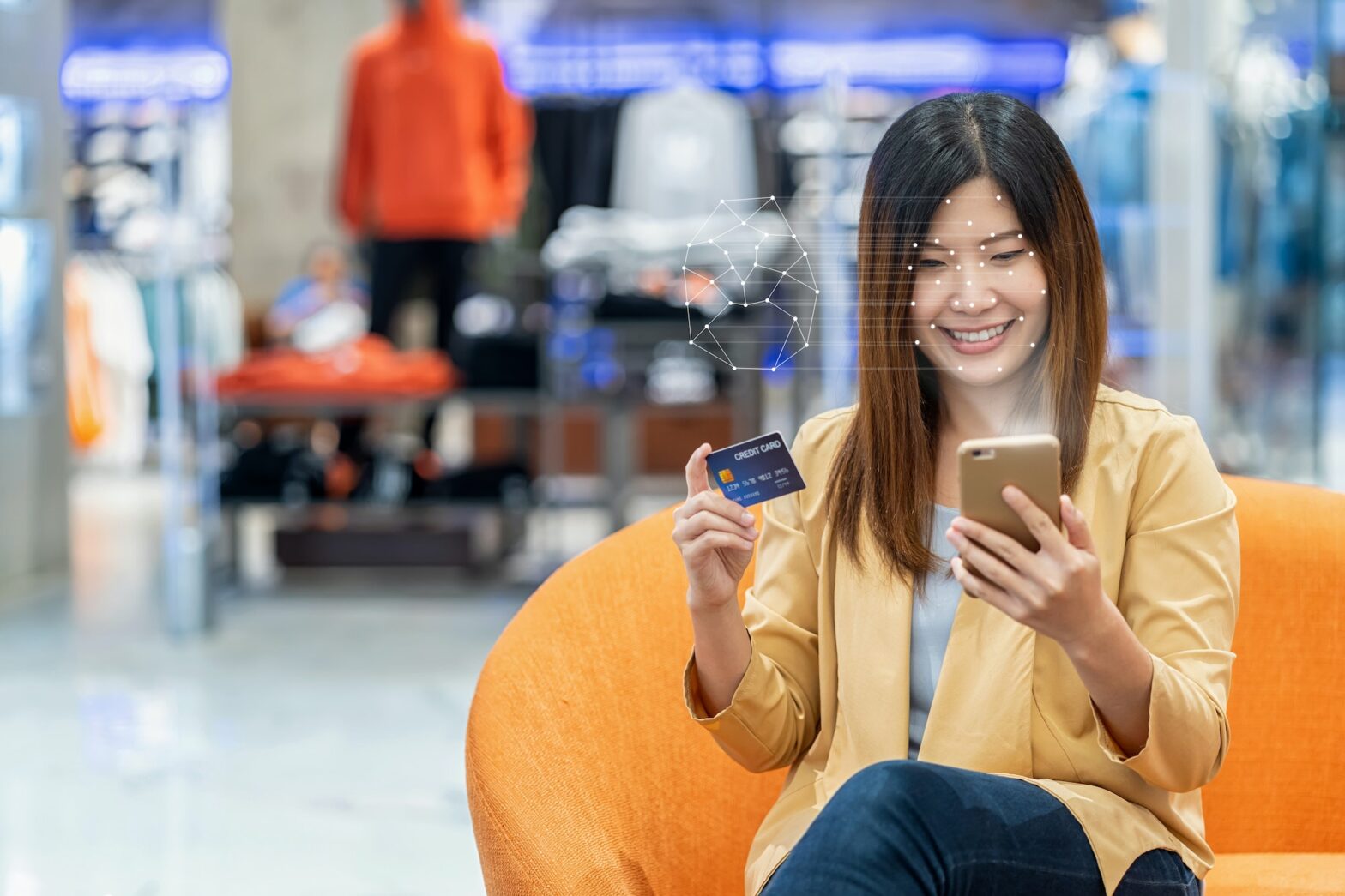 Asian women using the technology tablet for access control by face recognition